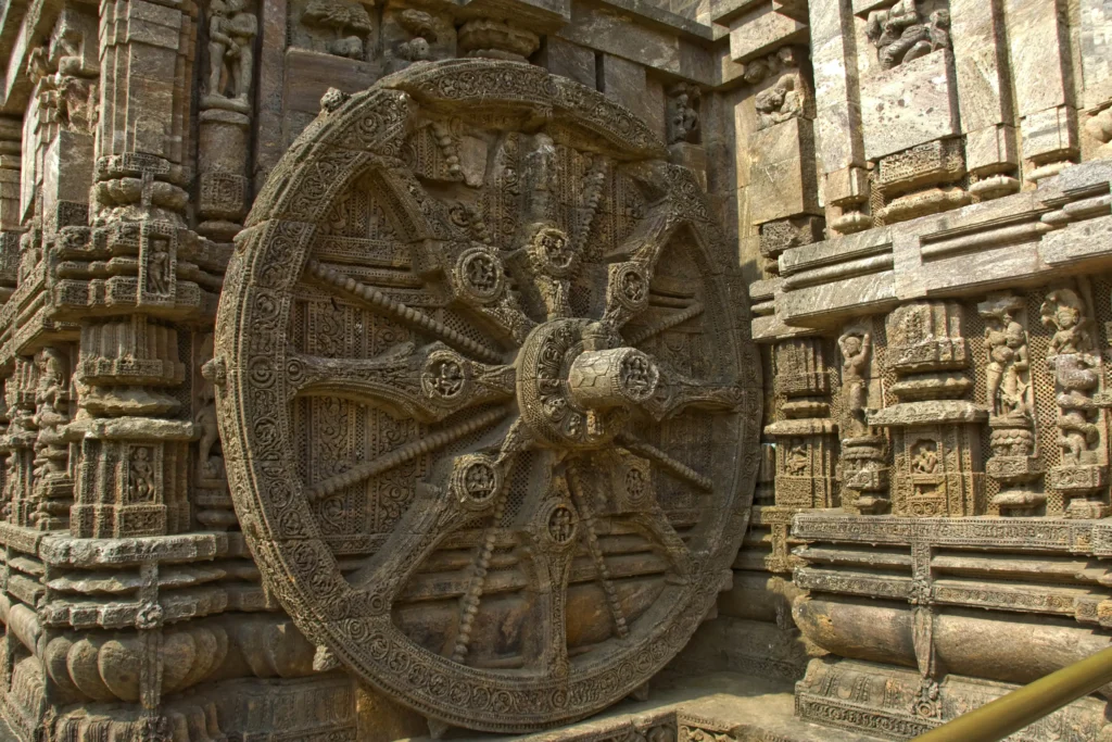 10 Architectural Marvels of Hindu India: A Historian's Journey Through Stone and Spirit 4 Intricately carved stone chariot wheel from the 13th-century Konark Sun Temple in Odisha, exemplifying classical Hindu temple architecture