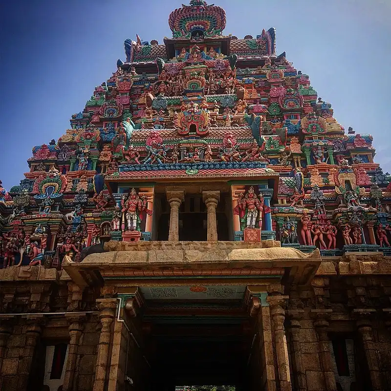 10 Architectural Marvels of Hindu India: A Historian's Journey Through Stone and Spirit 8 The colorful gopuram of Meenakshi Amman Temple in Madurai exemplifies intricate Dravidian architecture with detailed sculptures and vibrant artwork